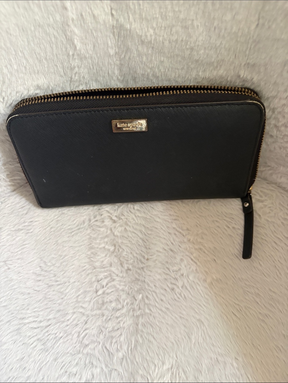 kate spade black leather zip-around wallet with gold hardware